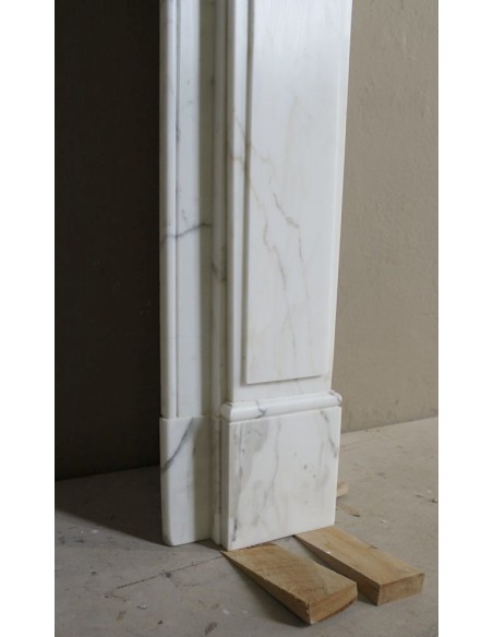 Antique neoclassical "Macaron" mantelpiece carved in Statuary Carrara marble, with exquisite architectural design.