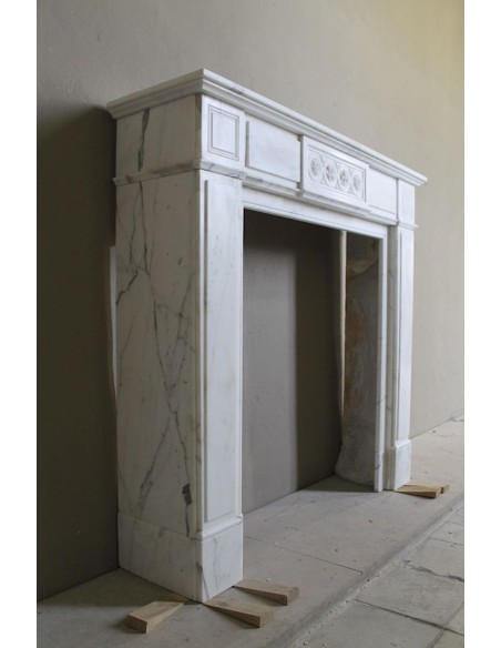 Antique neoclassical "Macaron" mantelpiece carved in Statuary Carrara marble, with exquisite architectural design.