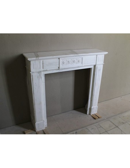 Antique neoclassical "Macaron" mantelpiece carved in Statuary Carrara marble, with exquisite architectural design.