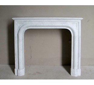 Antique white marble fireplace mantel called “Boudin Arrondi” because of its sinuous and refined lines.