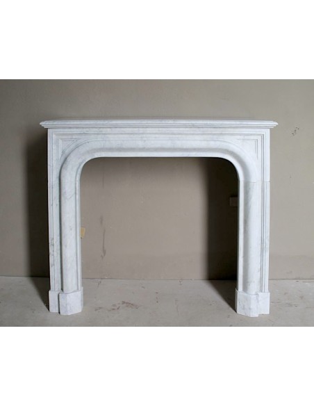 Antique white marble fireplace mantel called “Boudin Arrondi” because of its sinuous and refined lines.