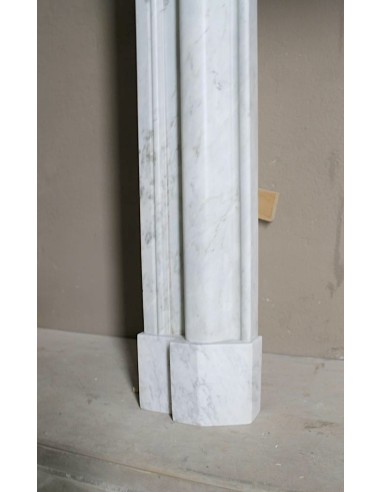 Antique white marble fireplace mantel called “Boudin Arrondi” because of its sinuous and refined lines.