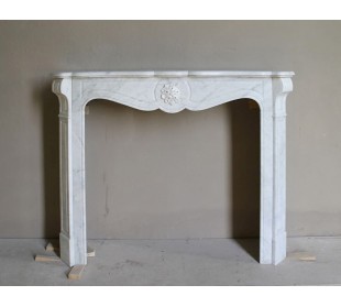 Antique “Pompadour” mantel in white Carrara marble at a discounted price, on sale. A beautiful mantelpiece at a very low price.