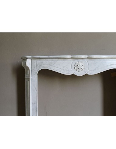 Antique “Pompadour” mantel in white Carrara marble at a discounted price, on sale. A beautiful mantelpiece at a very low price.