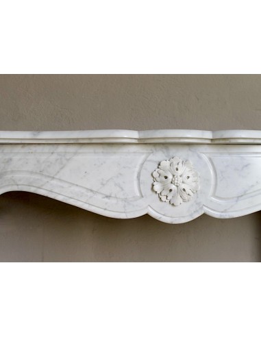 Antique “Pompadour” mantel in white Carrara marble at a discounted price, on sale. A beautiful mantelpiece at a very low price.