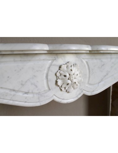 Antique “Pompadour” mantel in white Carrara marble at a discounted price, on sale. A beautiful mantelpiece at a very low price.