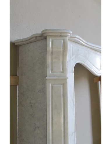 Antique “Pompadour” mantel in white Carrara marble at a discounted price, on sale. A beautiful mantelpiece at a very low price.