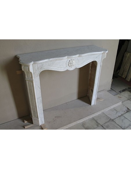 Antique “Pompadour” mantel in white Carrara marble at a discounted price, on sale. A beautiful mantelpiece at a very low price.