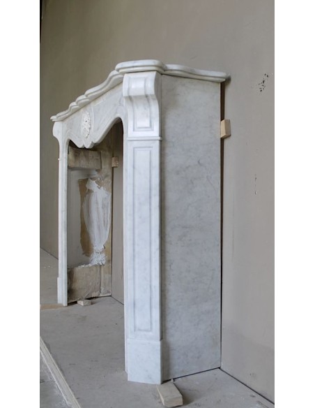 Antique “Pompadour” mantel in white Carrara marble at a discounted price, on sale. A beautiful mantelpiece at a very low price.
