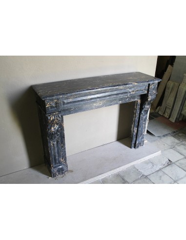 Genuine 19th century Portoro Gold marble fireplace mantel with diamond-pointed carvings.