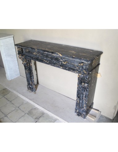 Genuine 19th century Portoro Gold marble fireplace mantel with diamond-pointed carvings.