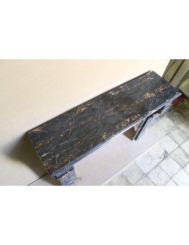 Genuine 19th century Portoro Gold marble fireplace mantel with diamond-pointed carvings.