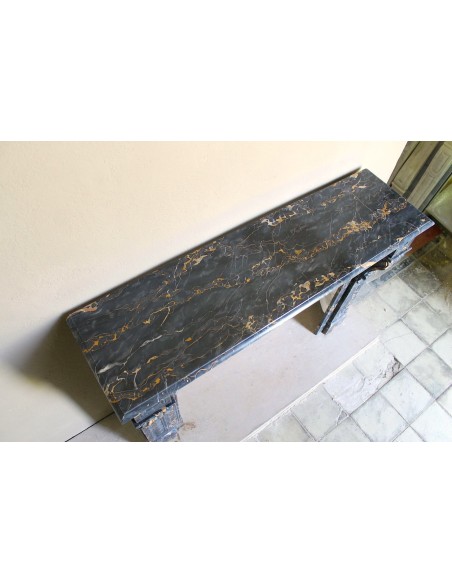 Genuine 19th century Portoro Gold marble fireplace mantel with diamond-pointed carvings.