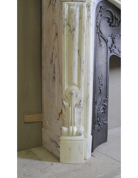 Antique Louis XV “Trois Glands” fireplace mantel in  White veined Calacatta marble provided with cast iron insert.