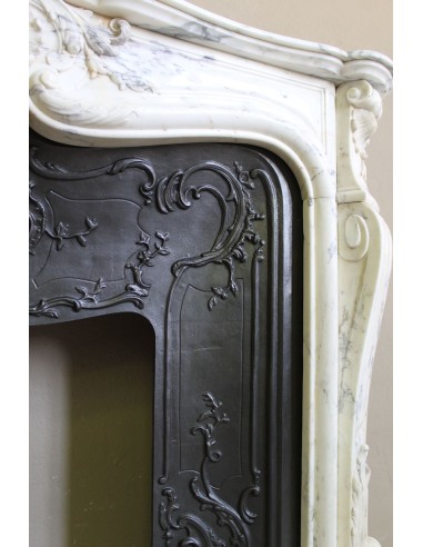 Antique Louis XV “Trois Glands” fireplace mantel in  White veined Calacatta marble provided with cast iron insert.