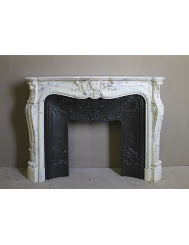Antique Louis XV “Trois Glands” fireplace mantel in  White veined Calacatta marble provided with cast iron insert.