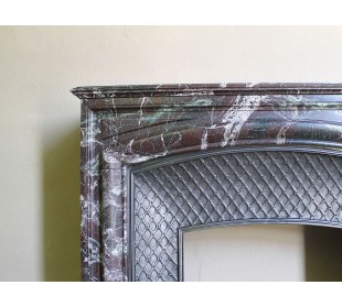 Antique “Boudin” mantelpiece in Levanto marble in red, green, violet, and white. This fireplace mantel has its cast iron insert. 2