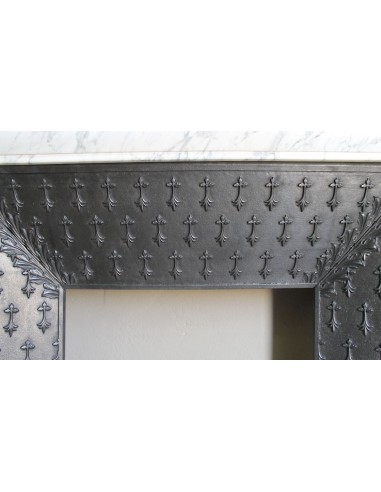 Antique “Boudin” fireplace mantel carved in veined white Calacatta marble. This mantel has its original cast iron insert.