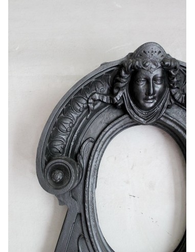 Cast iron Oeil de boeuf “Tête de Femme” mantelpiece. This mantel is genuine, authentic, signed by Majorelle.