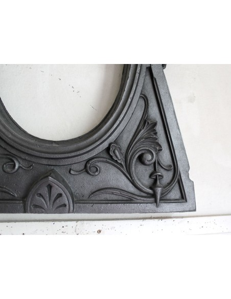 Cast iron Oeil de boeuf “Tête de Femme” mantelpiece. This mantel is genuine, authentic, signed by Majorelle.