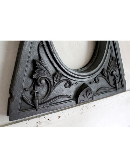 Cast iron Oeil de boeuf “Tête de Femme” mantelpiece. This mantel is genuine, authentic, signed by Majorelle.