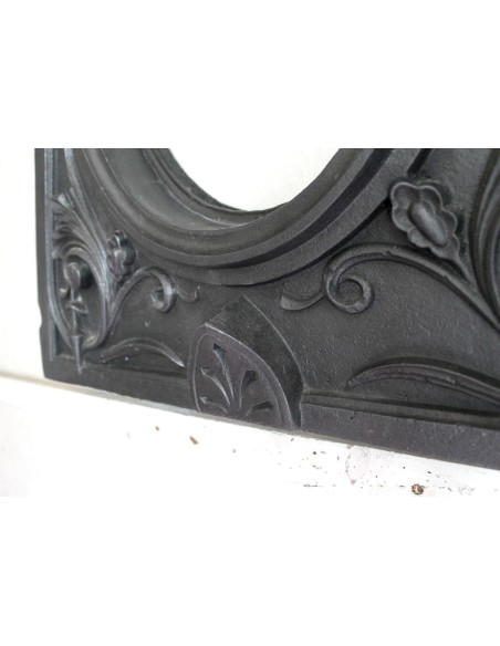 Cast iron Oeil de boeuf “Tête de Femme” mantelpiece. This mantel is genuine, authentic, signed by Majorelle.