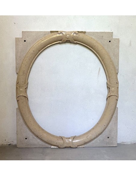 Antique Art Deco style fireplace mantel, carved in taupe marble. This suspended oeil de boeuf mantelpiece is totally original.