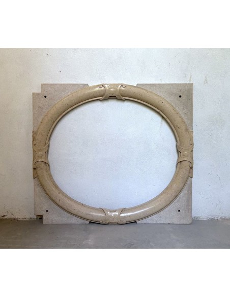 Antique Art Deco style fireplace mantel, carved in taupe marble. This suspended oeil de boeuf mantelpiece is totally original.