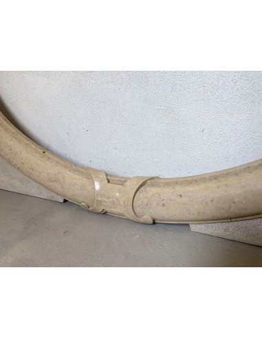 Antique Art Deco style fireplace mantel, carved in taupe marble. This suspended oeil de boeuf mantelpiece is totally original.