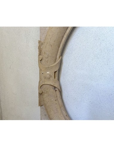 Antique Art Deco style fireplace mantel, carved in taupe marble. This suspended oeil de boeuf mantelpiece is totally original.