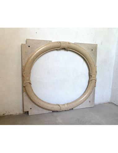 Antique Art Deco style fireplace mantel, carved in taupe marble. This suspended oeil de boeuf mantelpiece is totally original.