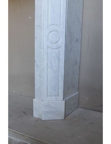 Beautiful mantelpiece carved in white Carrara marble. This fireplace mantel is antique and genuine, Louis XV style.