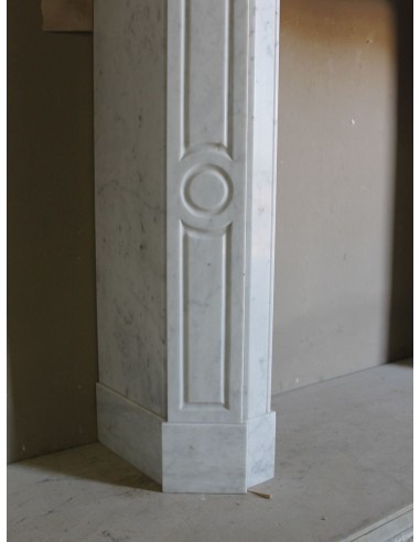Beautiful mantelpiece carved in white Carrara marble. This fireplace mantel is antique and genuine, Louis XV style.