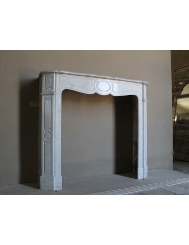 Beautiful mantelpiece carved in white Carrara marble. This fireplace mantel is antique and genuine, Louis XV style.