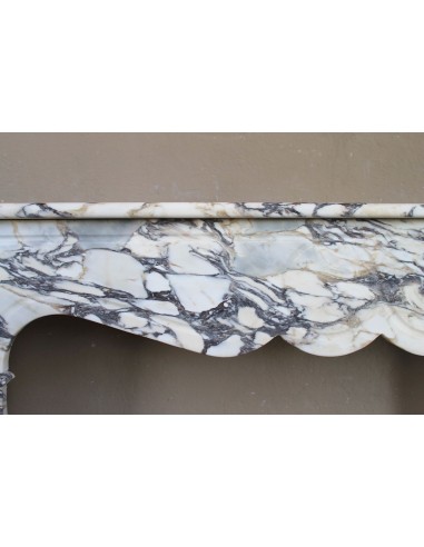 Antique Louis XV “Pompadour Plat” fireplace in Breccia Medicea marble, with veining from white to blue, purple to gold.