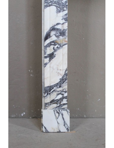 Antique Louis XV “Pompadour Plat” fireplace in Breccia Medicea marble, with veining from white to blue, purple to gold.