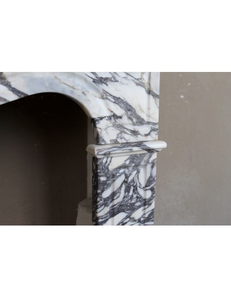 Antique Louis XV “Pompadour Plat” fireplace in Breccia Medicea marble, with veining from white to blue, purple to gold.