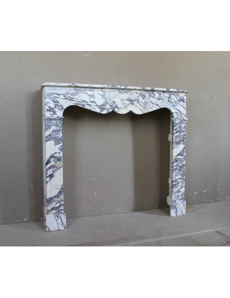 Antique Louis XV “Pompadour Plat” fireplace in Breccia Medicea marble, with veining from white to blue, purple to gold.