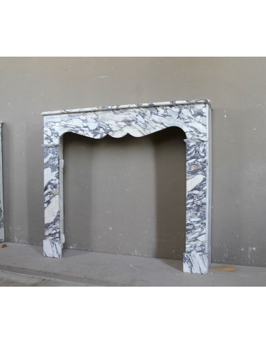 Antique Louis XV “Pompadour Plat” fireplace in Breccia Medicea marble, with veining from white to blue, purple to gold.