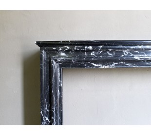 Antique “Bolection" mantelpiece in black marble with white veins. This is an elegant, contemporary and minimalist mantel. 2