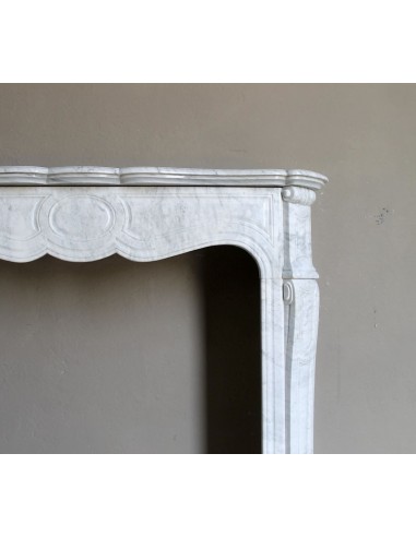 Antique Louis XV Pompadour "Pied Galbé" fireplace mantel in white marble offered at a low discounted price.