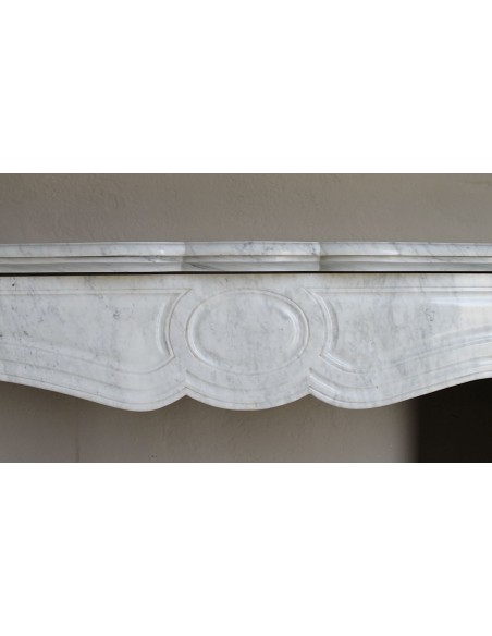 Antique Louis XV Pompadour "Pied Galbé" fireplace mantel in white marble offered at a low discounted price.