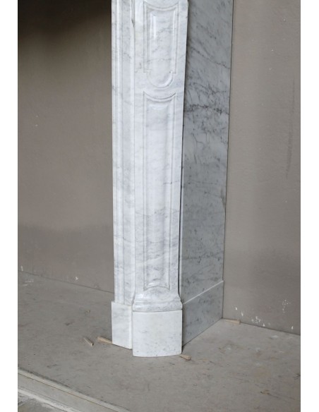 Antique Louis XV Pompadour "Pied Galbé" fireplace mantel in white marble offered at a low discounted price.