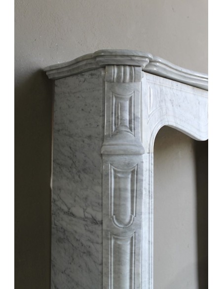 Antique Louis XV Pompadour "Pied Galbé" fireplace mantel in white marble offered at a low discounted price.