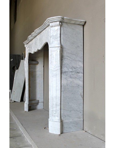 Antique Louis XV Pompadour "Pied Galbé" fireplace mantel in white marble offered at a low discounted price.