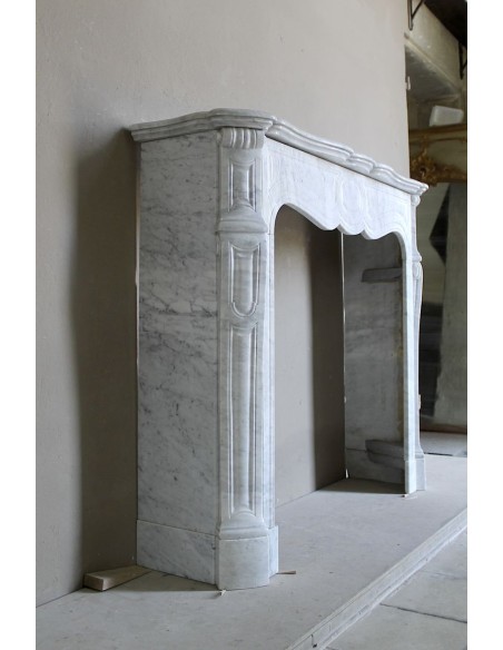 Antique Louis XV Pompadour "Pied Galbé" fireplace mantel in white marble offered at a low discounted price.