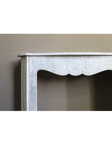 Antique Louis XV style fireplace mantel in white Carrara marble, “Pompadour” family, with its original marble floor.
