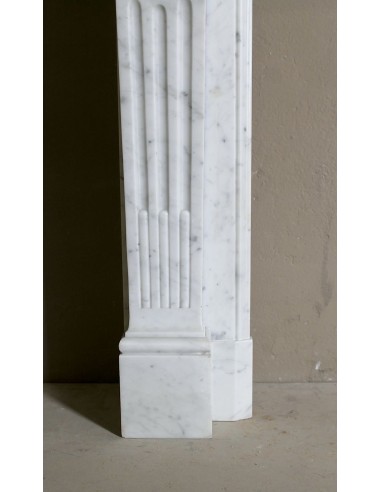 Louis XVI “Olive Branch” fireplace mantel with floral carvings in white marble, mid 20th century, offered at a discounted price.