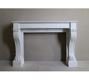 Antique marble mantel carved in white marble, with lion's paw details. This fireplace is original, authentic, a unique piece.