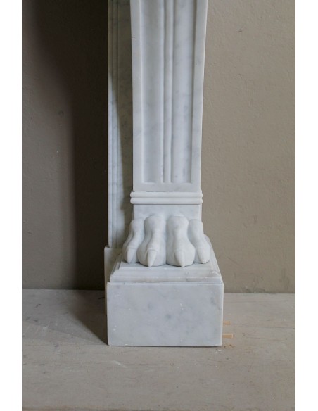 Antique marble mantel carved in white marble, with lion's paw details. This fireplace is original, authentic, a unique piece.